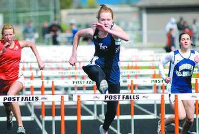 
Arica Johnson of Lake City wins going away in the 100-meter hurdles at the Meet of Champions at Post Falls High.
 (Jesse Tinsley / The Spokesman-Review)