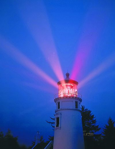 The Umpqua River Lighthouse  has been operational since 1894. The Coast Guard is considering moving its lens and glass panels to a museum.  (Associated Press)