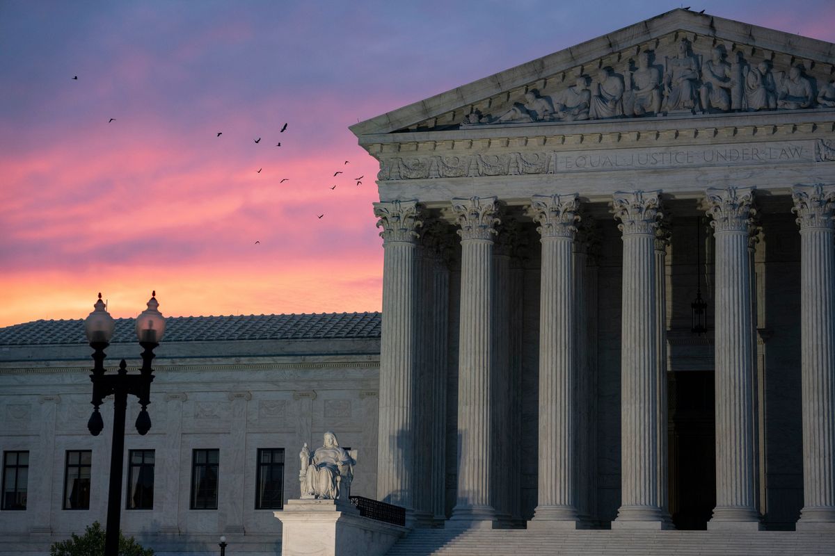 FILE -- The U.S. Supreme Court at sunrise on Sunday, Aug. 7, 2022. Former President Donald Trump asked the Supreme Court to bar the Justice Department from reviewing documents marked as classified that the FBI removed from his Florida estate, saying that an appeals court had lacked jurisdiction to rule on the matter. (Haiyun Jiang/The New York Times) (HAIYUN JIANG)