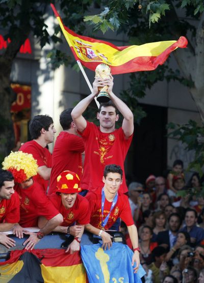 Spain captain Iker Casillas lifts the World Cup trophy in Madrid.  (Associated Press)