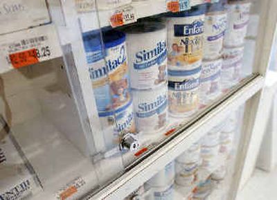 
Baby formula is seen for sale in a locked display case in a Bethlehem, Pa., market on Friday. 
 (Associated Press / The Spokesman-Review)