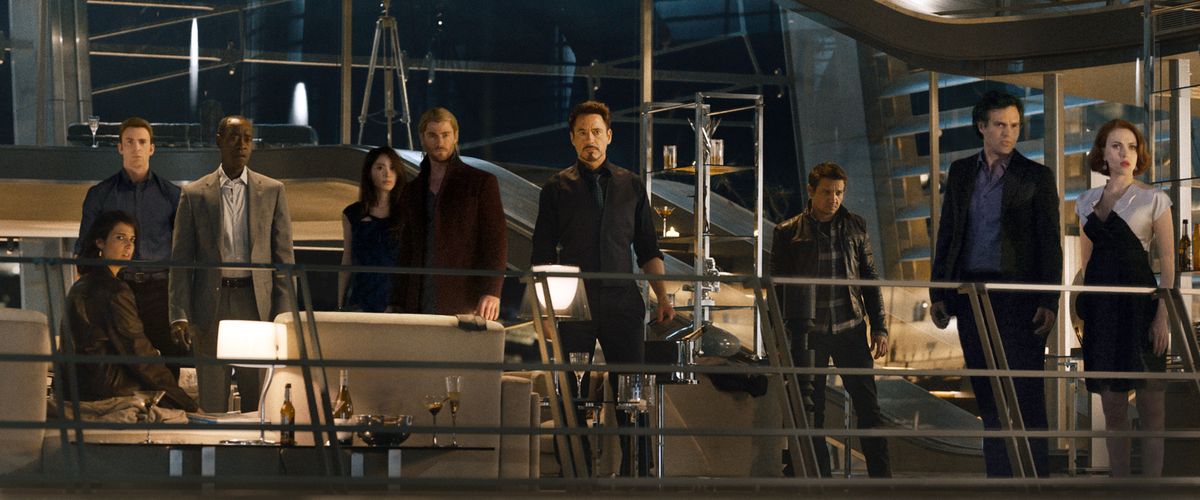 From left, Cobie Smulders, seated, Chris Evans, Don Cheadle, Claudia Kim, Chris Hemsworth, Robert Downey Jr., Jeremy Renner, Mark Ruffalo and Scarlett Johansson star in the film “Avengers: Age Of Ultron.”