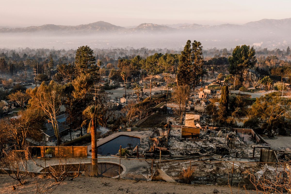 FILE -- Homes burned by the Eaton fire in Altadena, Calif., Jan. 10, 2025. The floods that struck just before the first anniversary of the January wildfires show how extreme weather is defining life in the Los Angeles region. (Mark Abramson/The New York Times)  (MARK ABRAMSON)