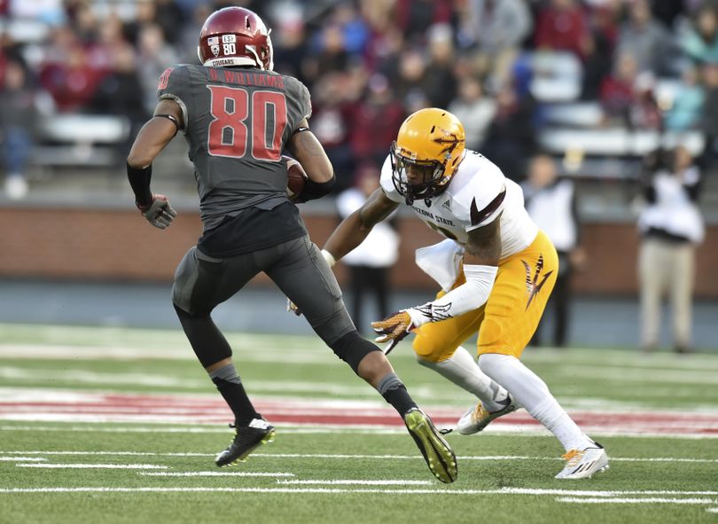 WSU receiver Dom Williams (80) slips an Arizona State tackle and runs for a touchdown during the second half of a Pac-12 college football game on Saturday, Nov 7, 2015, at Martin Stadium in Pullman, Wash. WSU won the game 38-24. (Tyler Tjomsland / The Spokesman-Review)