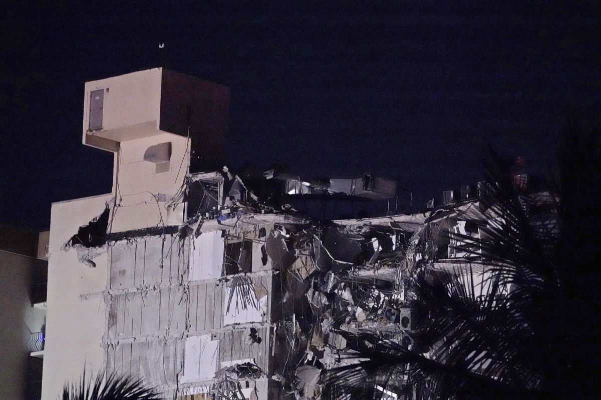 A partial collapsed building is seen early Thursday, June 24, 2021, in Surfside area of Miami, Fla. A partial building collapse in Miami caused a massive response early Thursday from Miami Dade Fire Rescue, according to a tweet from the department