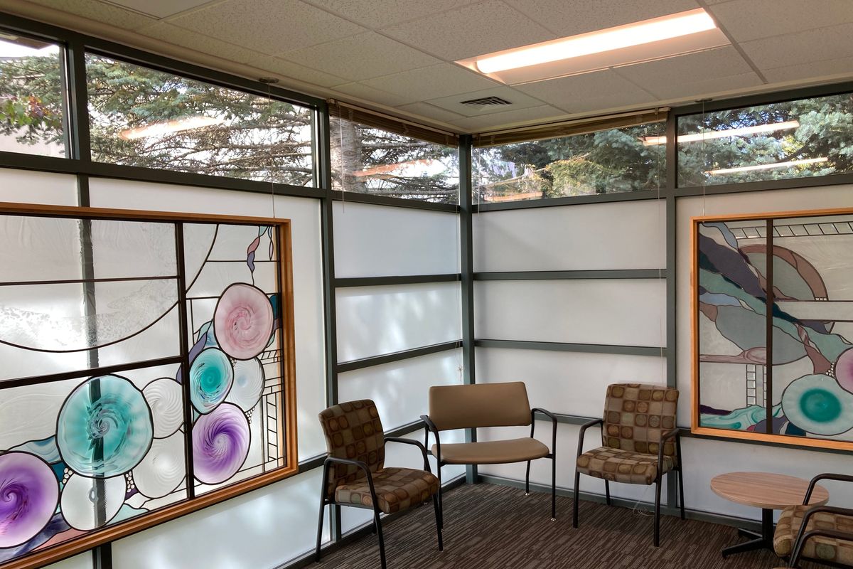 MultiCare opened a new behavioral health clinic Tuesday in Hillyard that's aimed at improving access for youth and their families. The $2.58 million project created a waiting room, 21 treatment rooms and three large group therapy rooms, along with a community classroom. The 8,200-square foot facility, within remodeled space of the former Hillyard Library, uses some of the building's original features such as natural lighting and stained-glass artwork.  (Jesse Tinsley/THE SPOKESMAN-REVIEW)