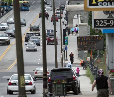 The Monroe Street Bridge, looking south from Broadway Avenue, was a busy scene for vehicles and pedestrians Wednesday. (Dan Pelle)