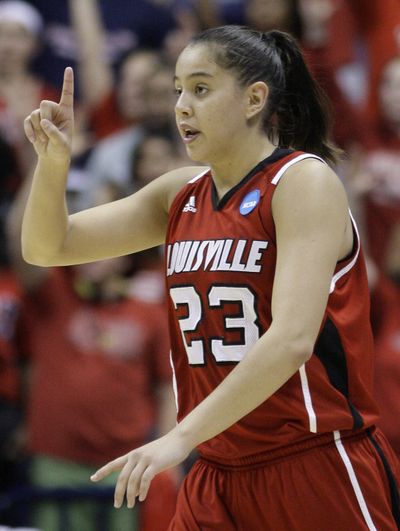 Louisville guard Shoni Schimmel heads upcourt late in the second half of a second-round NCAA tournament college basketball game against Xavier, Tuesday, March 22, 2011, in Cincinnati. Schimmel led Louisville to an 85-75 win with 33 points. (Al Behrman / Associated Press)