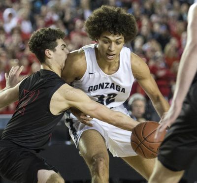 Gonzaga Prep’s Anton Watson, right, drives against the defense of Mt. Si’s Jonny Barrett during action in the State 4A boys basketball championship game Saturday, March 2, 2019, at the Tacoma Dome in Tacoma, Wash. (Patrick Hagerty / For The Spokesman-Review)
