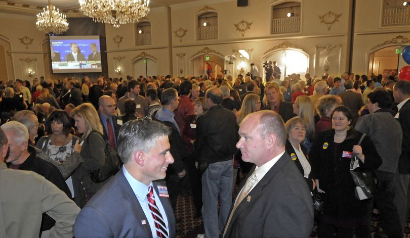 Michael Baumgartner, left, and Spokane County Sheriff Ozzie Knezovich talk during a Republican Party election night celebration at the Davenport Hotel on Tuesday, Nov, 2, 2010. (Christopher Anderson / The Spokesman-Review)