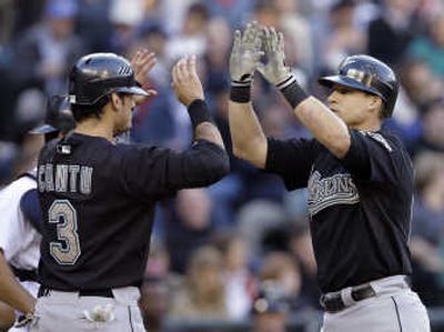 
Florida's Mike Jacobs, right, is greeted at home plate by Jorge Cantu after Jacobs' home run in the third inning Wednesday. Associated Press
 (Associated Press / The Spokesman-Review)