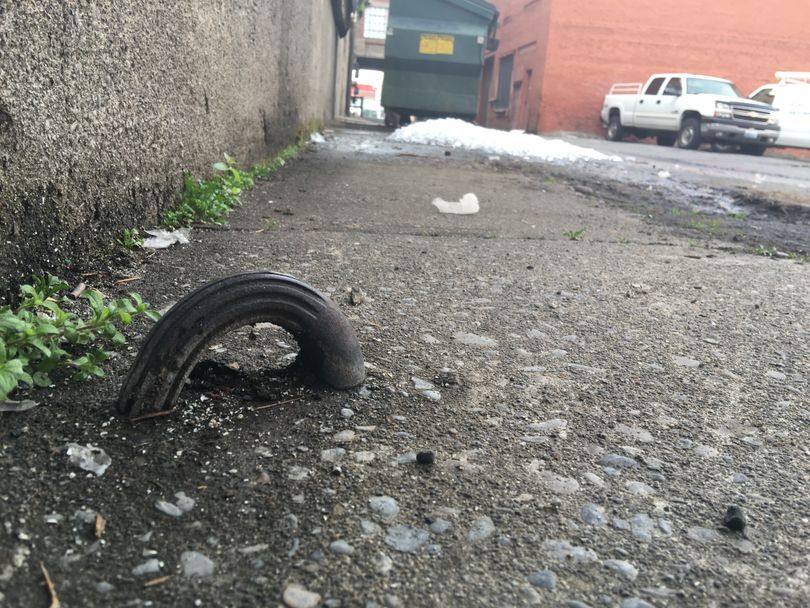 A steel hoop sits outside the Pacific Pak Wholesale Ice plant. It was used to tie up horses at the loading dock. 