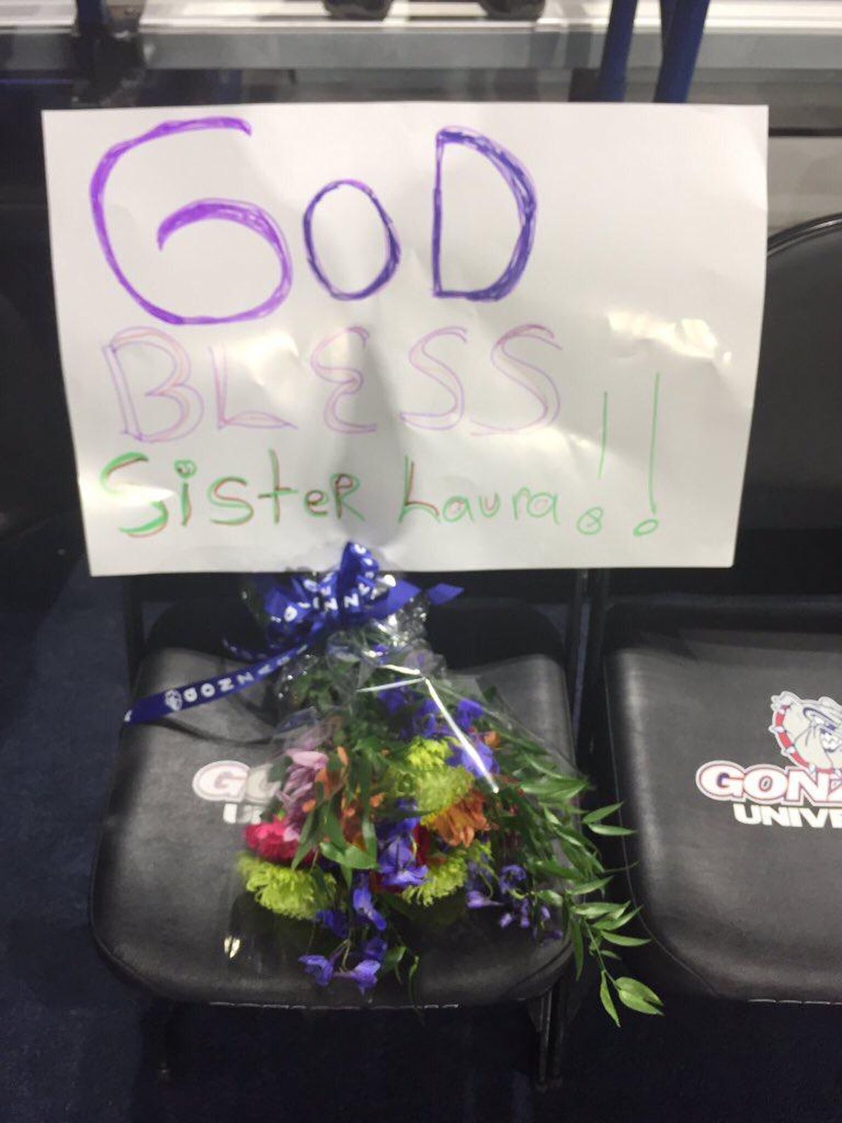 A sign is placed on the Gonzaga University seat of Sister Laura Michel. (Courtesy of Kendra Andrews)