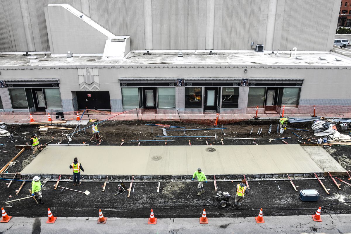 Cameron-Reilly Concrete crews pour a STA City Line bus pad outside the Martin Woldson Theater at the Fox on Sprague Avenue in this photo from March.  (DAN PELLE/THE SPOKESMAN-REVIEW)