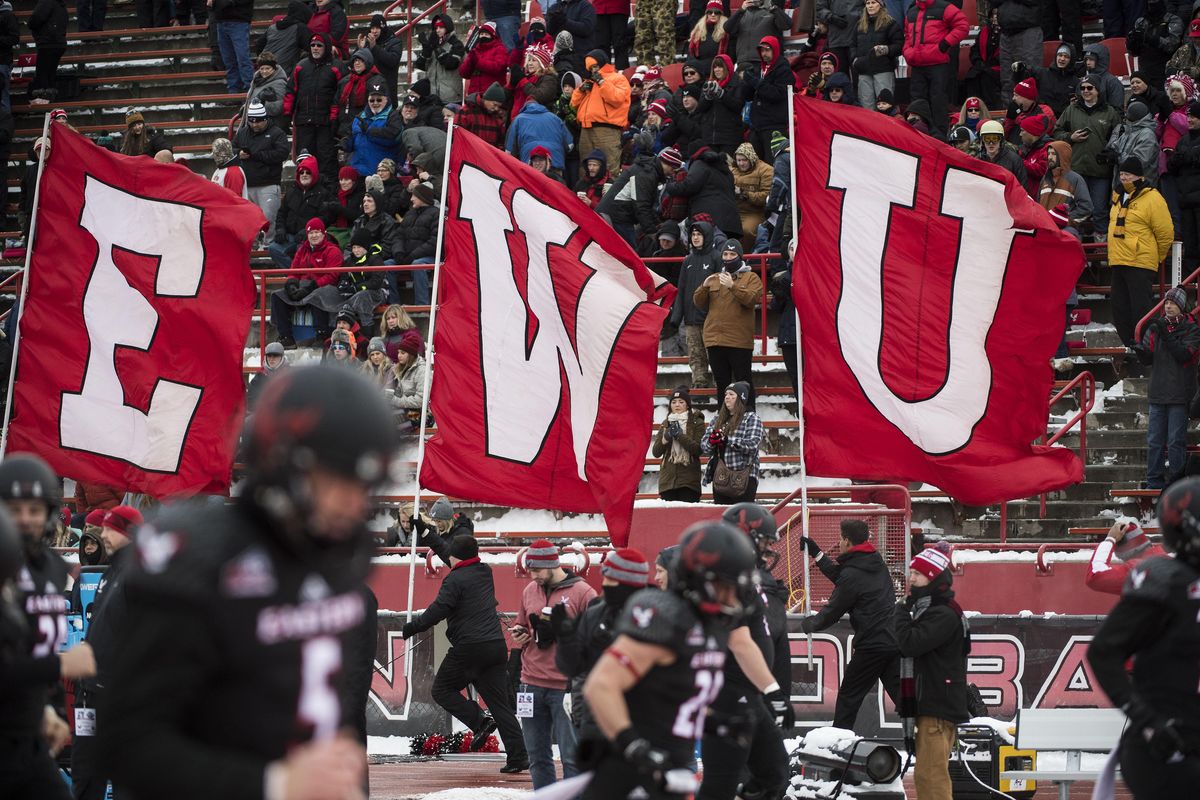 EWU flags parade around the field before the game with Richmond, Sat., Dec. 10, 2016, in Cheney, Wash. (Colin Mulvany / The Spokesman-Review)