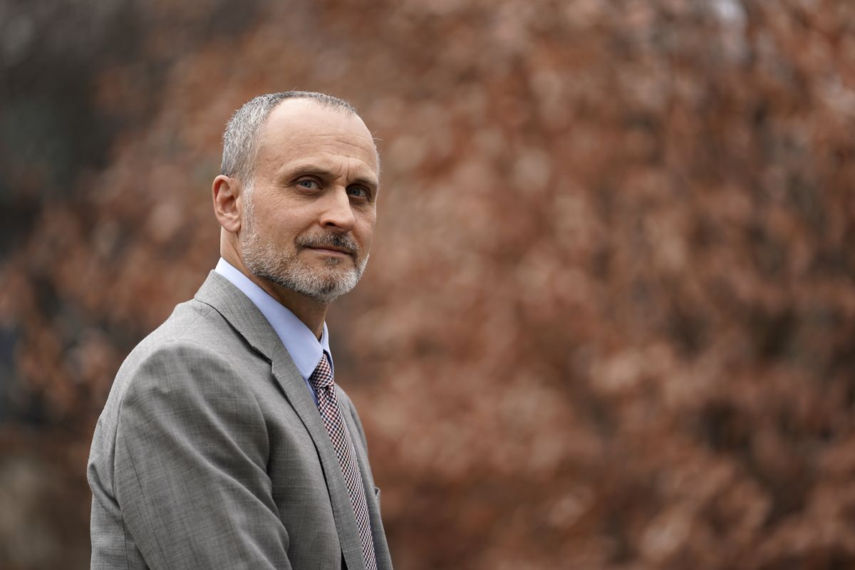 Kenneth Trzaska, President of Lewis &amp; Clark Community College, poses for a photo on the college's campus Dec. 15, 2021, in Godfrey, Ill. The small Illinois school canceled classes for days after a ransomware attack last month that knocked critical computer systems offline.  (Jeff Roberson)