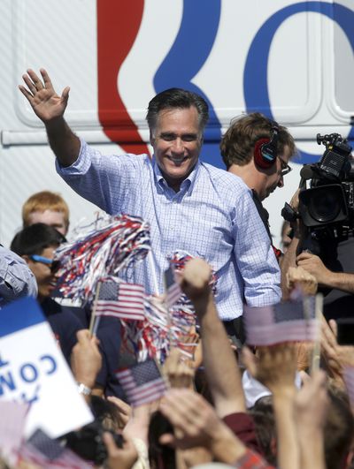 Republican presidential candidate, former Massachusetts Gov. Mitt Romney waves to supporters during a campaign event at Van Dyck Park, Thursday, Sept. 13, 2012, in Fairfax, Va. (Pablo Monsivais / Associated Press)
