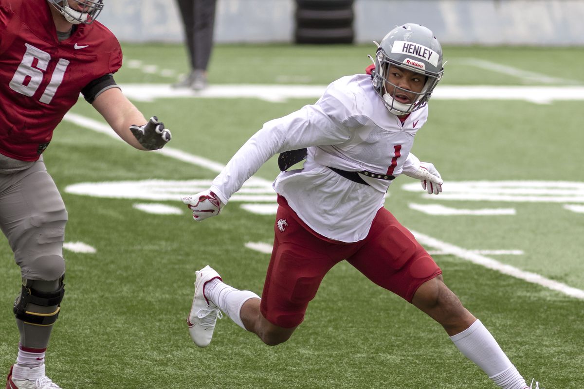 Washington State linebacker Daiyan Henley stands on the field during the  second half of an NCAA college football game against Utah, Thursday, Oct.  27, 2022, in Pullman, Wash. (AP Photo/Young Kwak Stock