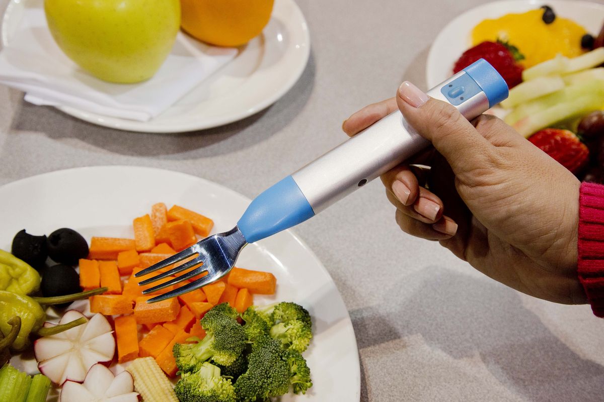 The HAPIfork vibrates and lights up to help its user slow down to a healthy eating pace. (Associated Press)