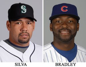 FILE - These are 2009 file photos showing Carlos Silva and Milton Bradley. A baseball official with knowledge of the trade says the Mariners have acquired mercurial outfielder Milton Bradley from the Chicago Cubs for expensive and underperforming pitcher Carlos Silva. The one-for-one deal was struck Friday morning, Dec. 18, 2009, the official said, speaking on condition anonymity because the trade had not been announced. (Associated Press)