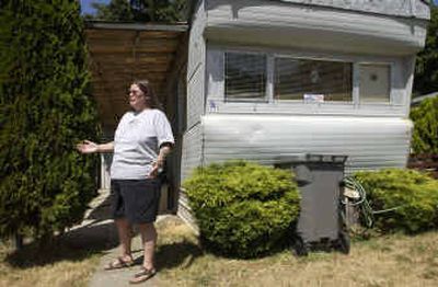 
Dawn Arrington, outside her 1960-vintage mobile home, asks why she wasn't given more notice that she must move from the Coeur d'Alene Mobile Home Park on Fruitland Avenue. 
 (Jesse Tinsley / The Spokesman-Review)