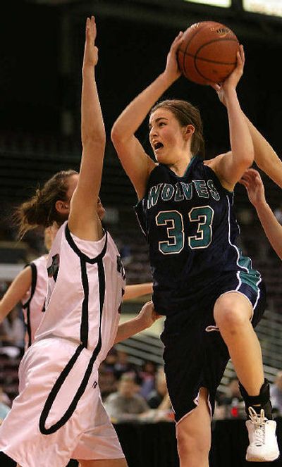 
Lake City's Katy Baker tries to work past Kolay Mickelsen and the tough Highland defense. 
 (MATT CILLEY Special to / The Spokesman-Review)