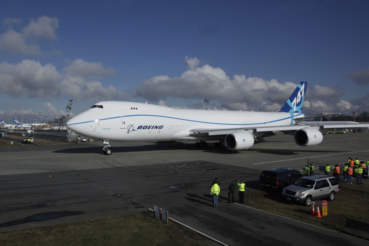 The Boeing 747-8 Freighter taxis for take off on its first flight Monday, Feb. 8, 2010, in Everett. (Ted Warren / Associated Press)