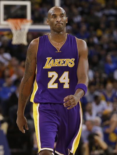 Los Angeles Lakers guard Kobe Bryant (24) walks on the floor during the second half of an NBA basketball game against the Golden State Warriors in Oakland, Calif., Tuesday, Nov. 24, 2015. The Warriors won 111-77. (AP Photo/Jeff Chiu) ORG XMIT: OAS119