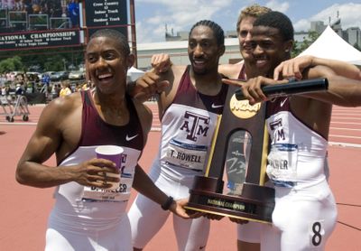 Texas A&M’s 4x400 relay team celebrates finishing second in the event and clinching the team championship for the Aggies.  (Associated Press / The Spokesman-Review)