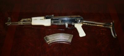 This pearl-handled AK-47, which belonged to Iraqi dictator Saddam Hussein, will be sent back to the Iraqi government.  (Associated Press / The Spokesman-Review)