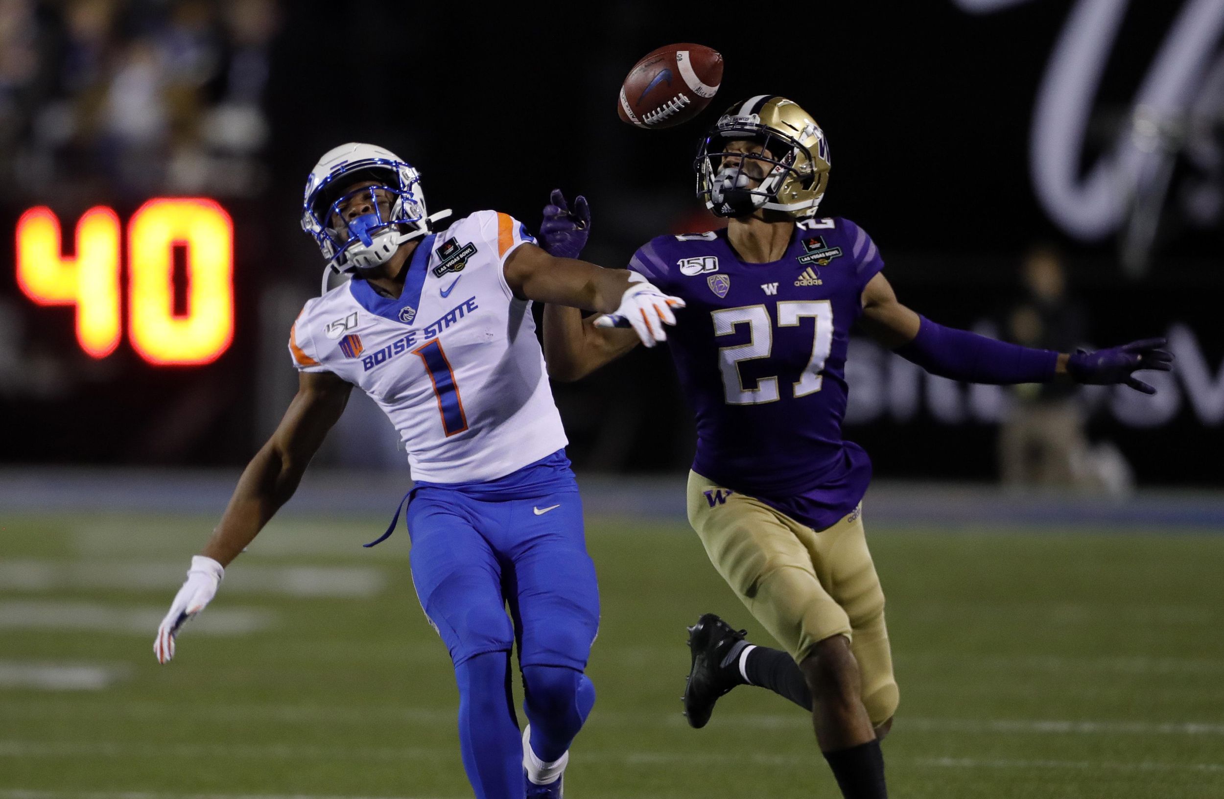 Washington dominates Boise State defensively, sends Chris Petersen out ...