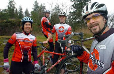 
Erika Krumpelman, left, Charlie Miller, above, Tommy McGrath, second from right, and Mike Gaertner are members of Team Vertical Earth's cyclocross team. 
 (Jesse Tinsley / The Spokesman-Review)
