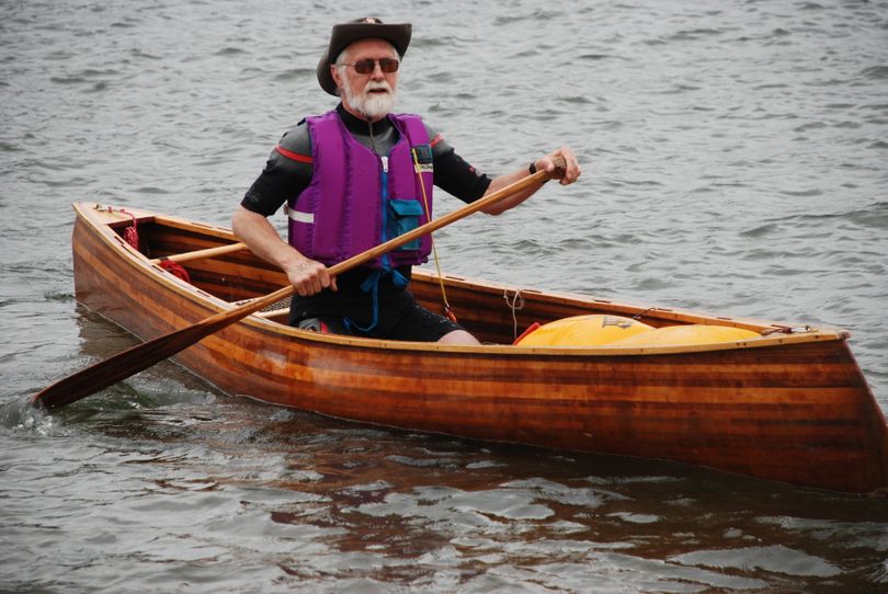 Stan Miller looks classic in the cedar strip solo canoe he paddled in the Sunday event.  (Rich Landers / The Spokesman-Review)