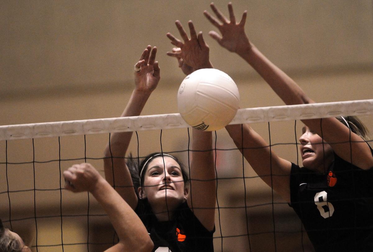 Lewis and Clark’s Emily Clary and Chloe Rowand team up to block a shot during a GSL victory over Mt. Spokane. (Rajah Bose / The Spokesman-Review)