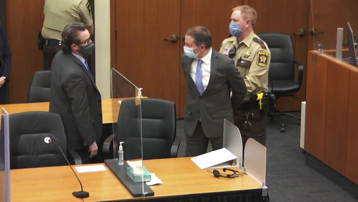 FILE - In this April 20, 2021 file image from video, former Minneapolis police Officer Derek Chauvin, center, is taken into custody as his attorney, Eric Nelson, left, looks on, after the verdicts were read at Chauvin