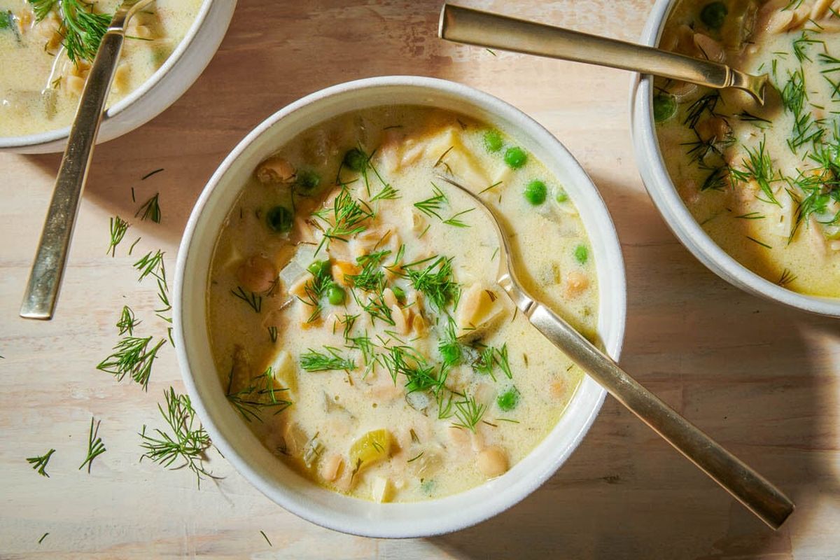 Avgolemono Chickpea Soup With Orzo and Dill uses an egg beaten with lemon juice to create a luxurious texture.  (Photos by Rey Lopez; food styling by Lisa Cherkasky/For The Washington Post)