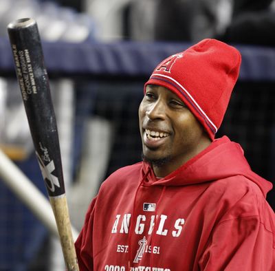 Chone Figgins and the Angels will face the Yankees today, weather permitting. (Associated Press / The Spokesman-Review)