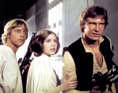Mark Hamill, Carrie Fisher and Harrison Ford on the set of 
