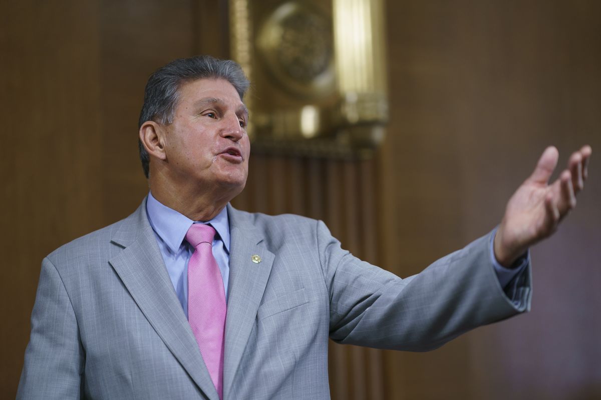 Sen. Joe Manchin, D-W.Va., chair of the Senate Energy and Natural Resources Committee, arrives to hold a confirmation hearing for Tommy Beaudreau of Alaska, to be deputy secretary of the Department of the Interior, at the Capitol in Washington, Thursday, April 29, 2021.  (J. Scott Applewhite)