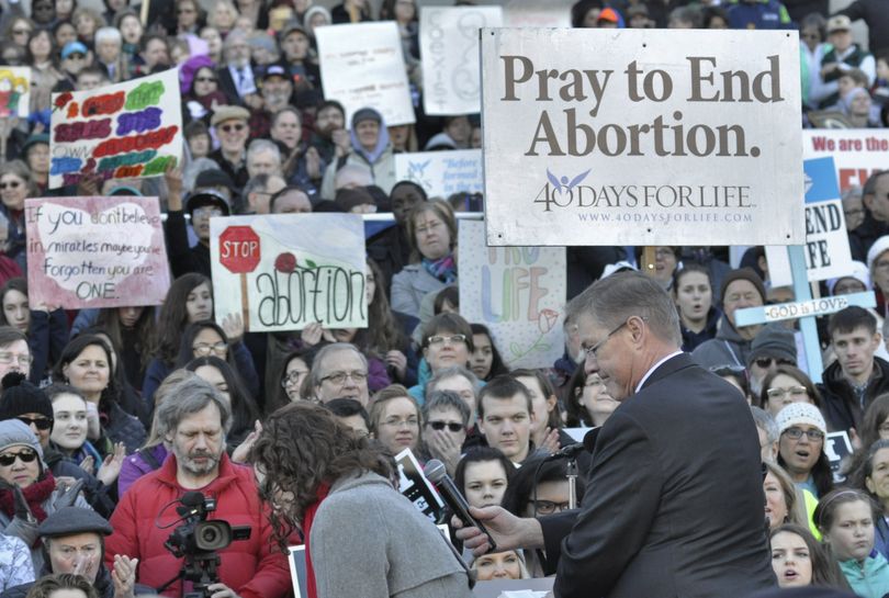 OLYMPIA -- Rep. Bob McCaslin, R-Spokane Valley, takes the microphone to address demonstrators from the March for Life on the steps of the state Capitol on 1/23/2017, (Jim Camden/The Spokesman-Review)