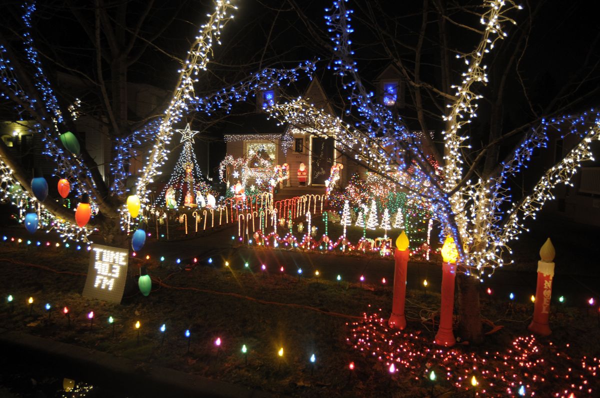 Christmas lights dominate the front walk and yard of this home at 427 E. 20th Ave. in Spokane.  (Christopher Anderson / The Spokesman-Review)