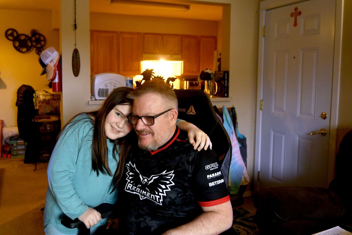 Cody Thueringer and his daughter, Genesis, 11 are photographed at their apartment in Spokane Valley last month. Thueringer is an Army and Air Force veteran, and is a beneficiary of the HUD-VASH program.  (Kathy Plonka/The Spokesman-Review)