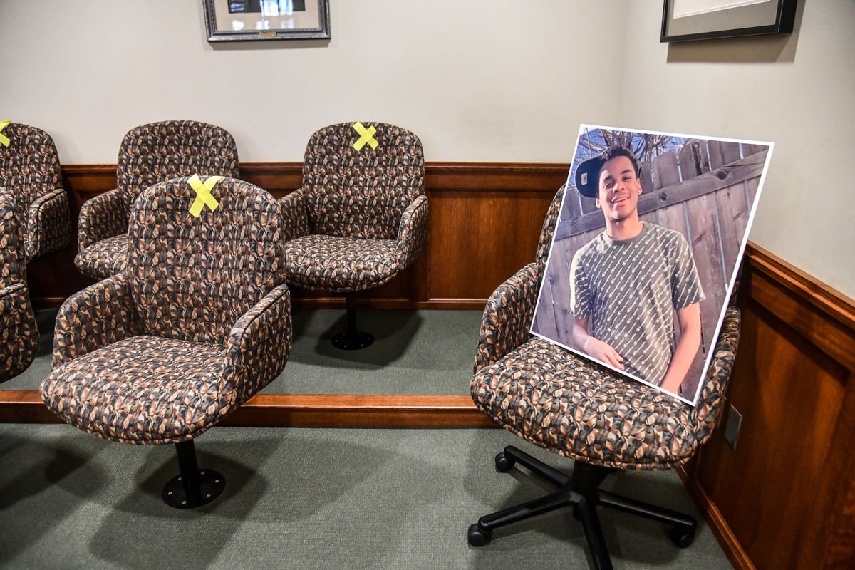 A portrait of murder victim Norvell Amos rests in the jury box during the sentencing of Vashaughn Eirls, Friday, June 25, 2021, in the courtroom of Judge Michael Price. Eirls pleaded guilty to second-degree murder in the October 2020 drive-by shooting of Amos.  (DAN PELLE/THE SPOKESMAN-REVIEW)