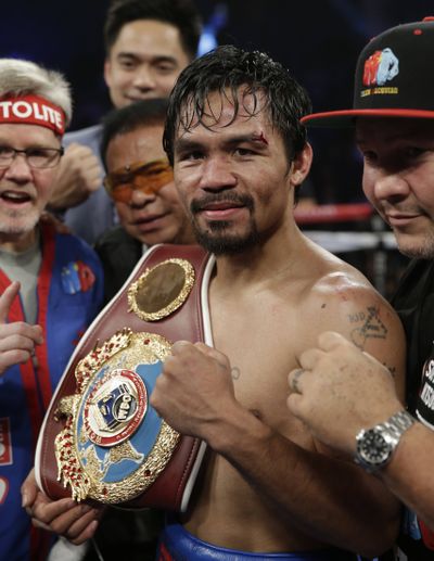 Welterweight title holder Manny Pacquiao will face Chris Algieri on Nov. 22 in Macau. (Associated Press)