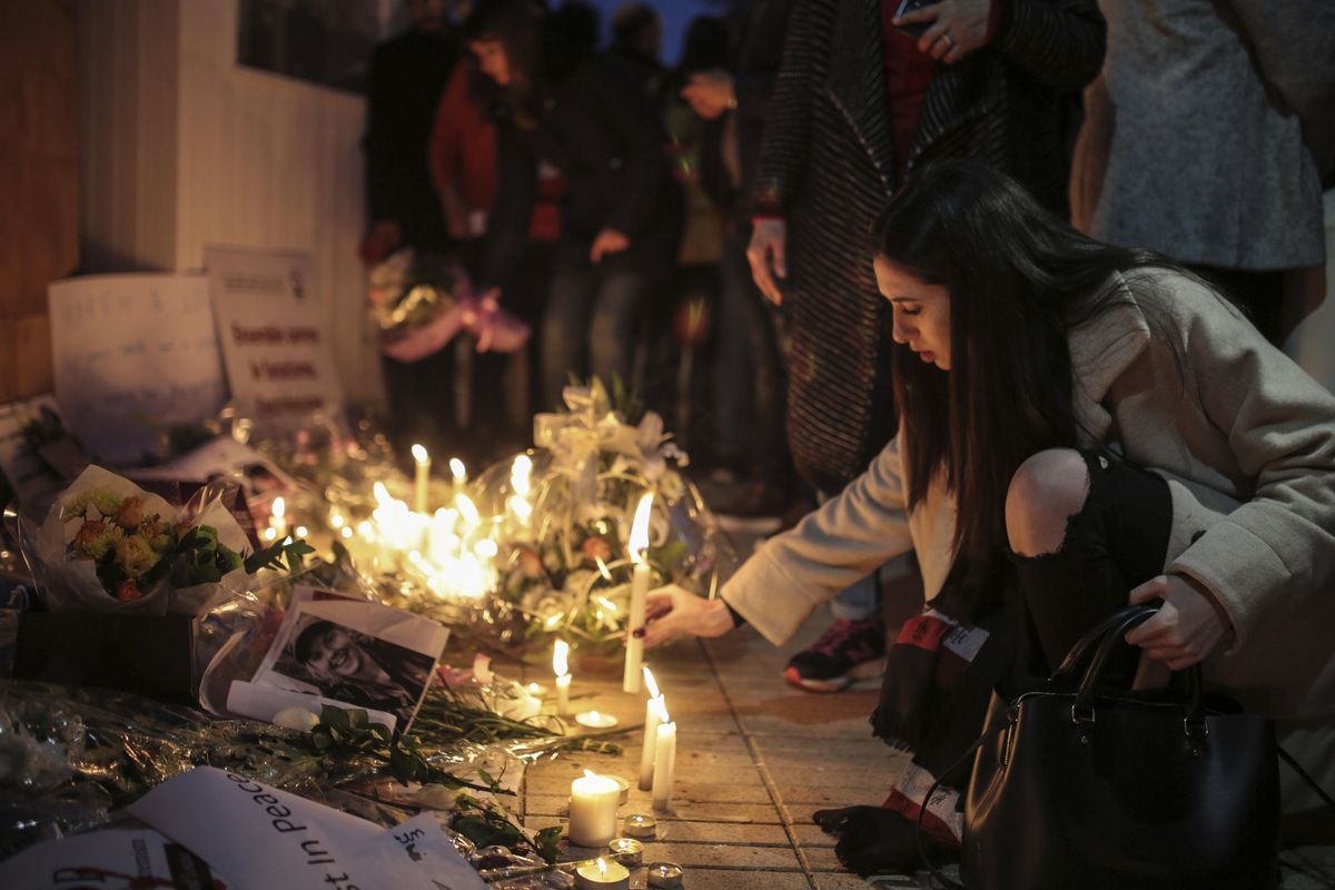 Moroccans lay flowers and messages during a candlelight vigil outside the Norwegian embassy in Rabat for two Scandinavian university students who were killed in a terrorist attack in a remote area of the Atlas Mountains, Morocco, on Saturday, Dec. 22, 2018. Moroccans gathered Saturday in front of the Norwegian and Danish embassies in Rabat in a candlelight vigil to honor two Scandinavian university students killed in a terrorist attack in the Atlas Mountains. (Mosa’ab Elshamy / AP)