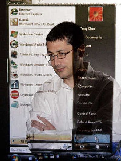 
Microsoft Corp. Internet Explorer general manager Dean Hachamovitch stands in front of a projected image of Microsoft's latest version of its web browser. 
 (Associated Press / The Spokesman-Review)