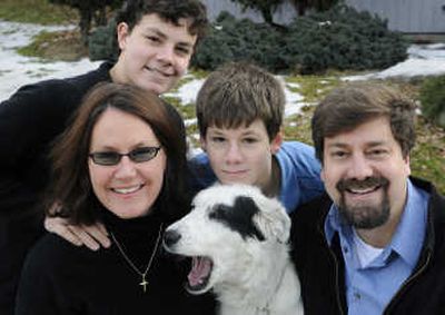 
From left, Sheryl, Ian, Philip and Scott Kinder-Pyle, along with their dog, Pearl, have moved back to Spokane after living on the East Coast.
 (Dan Pelle / The Spokesman-Review)