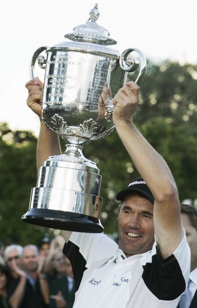 Ireland’s Padraig Harrington lifts his Wanamaker Trophy after winning the PGA Championship, ending a 78-year drought without a European winner at the event. He is also the only European golfer that has won back-to-back majors.  (Associated Press / The Spokesman-Review)