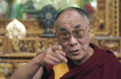 
Tibetan spiritual leader the Dalai Lama  speaks to the media in Dharmsala, India, on TuesdayAssociated Press
 (Associated Press / The Spokesman-Review)