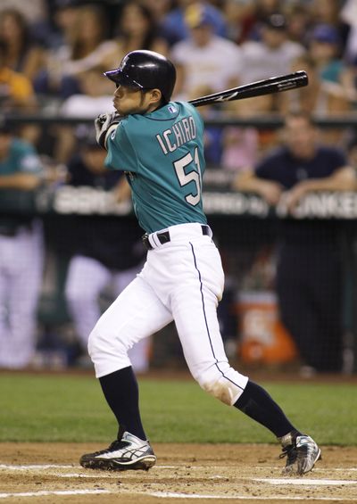 Ichiro Suzuki’s third-inning solo home run helps the Mariners swat Kansas City 7-3 on Friday night. (Associated Press)